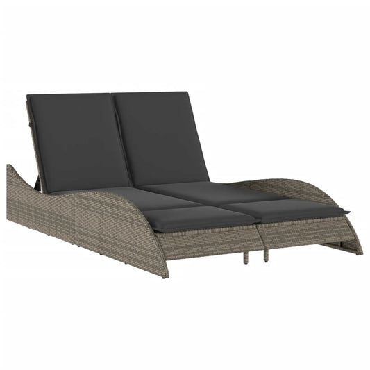 Chaise longue avec coussins gris en résine tressée